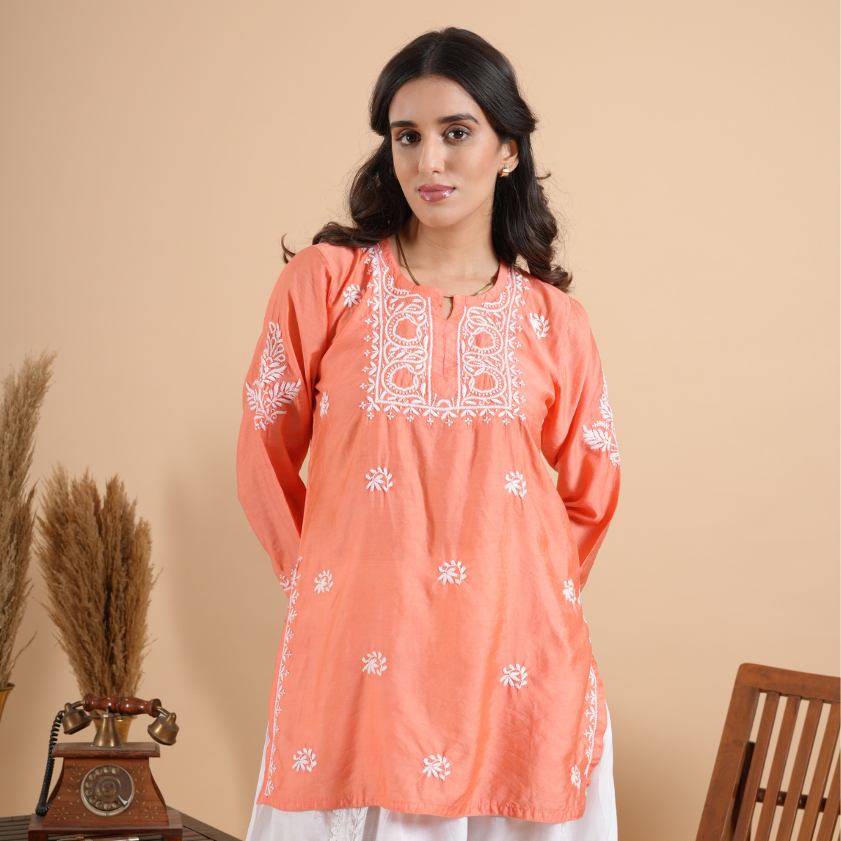 Peach chikankari short kurti with hand embroidery