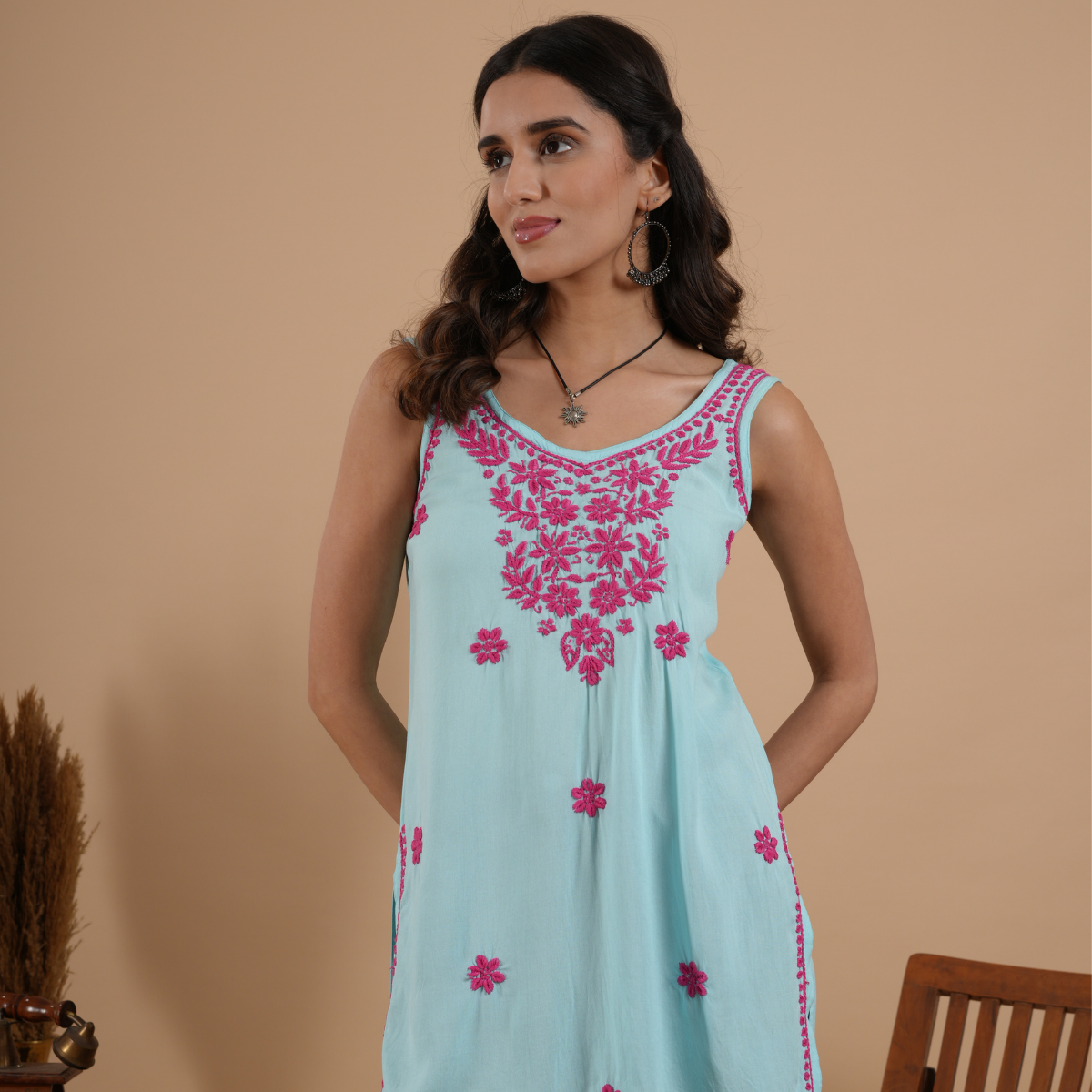 Turquoise blue rayon chikankari sleeveless short kurti